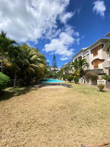 Πισίνα στο ή κοντά στο Waterside Complex - Beachfront Villa in Grand Baie