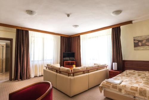 Postel nebo postele na pokoji v ubytování Elina Hotel