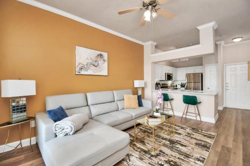 a living room with a couch and a kitchen at Nrg Stadium Rodeo Unit in Houston