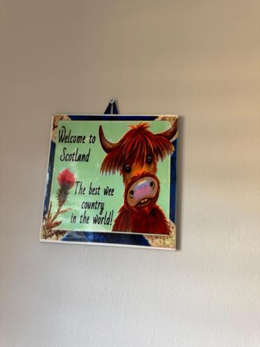 a picture of a sign with a cow at City break in Edinburgh