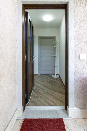 a door leading into a bathroom with a shower at Sonia Holiday Home - Camera Susan in Pont-Saint-Martin