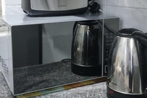 Kuchyň nebo kuchyňský kout v ubytování Cosy Lake View Apartment, Netflix, Internet