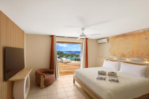 Ένα ή περισσότερα κρεβάτια σε δωμάτιο στο Villa 3 chambres rénovée avec piscine et vue incroyable