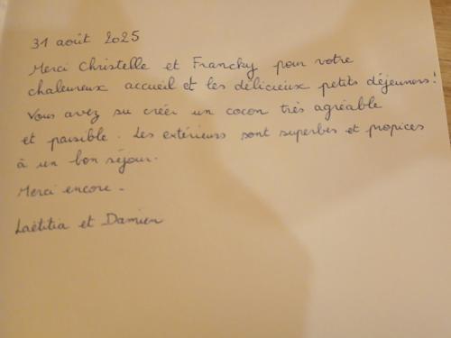 a letter with handwriting on a piece of paper at Les Bichettes in Mortagne-sur-Sèvre