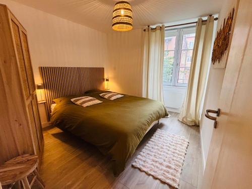 Postel nebo postele na pokoji v ubytování Appartement Mulhouse Centre historique