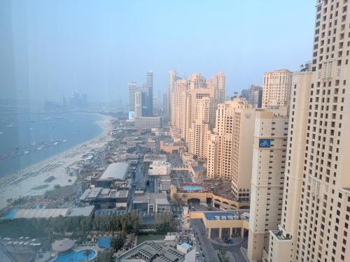 Beachfront Luxury Penthouse at The Walk JBR next to Bluewaters Island - 2BR & Maids Room