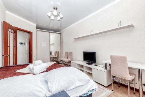 Postel nebo postele na pokoji v ubytování Комфортная однокомнатная квартира возле Астана Вижн и КазГЮУ