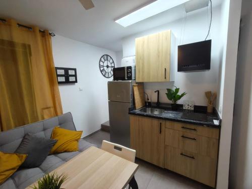 Kuchyň nebo kuchyňský kout v ubytování Apartamentos Carmen Baja 35