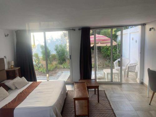 Ένα ή περισσότερα κρεβάτια σε δωμάτιο στο Caramel