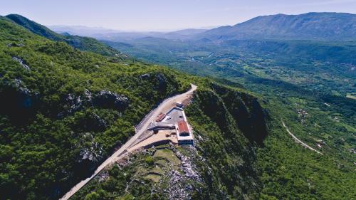 an aerial view of a road in the mountains at Hotel Sokoline in Danilovgrad