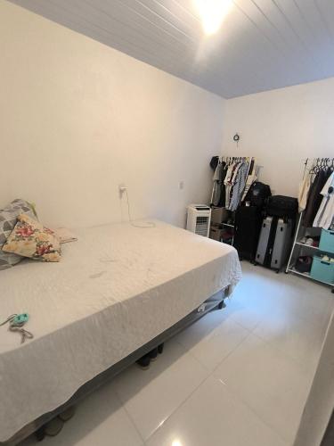 En eller flere senge i et værelse på Lindo apartamento mobiliado - Belém Centro