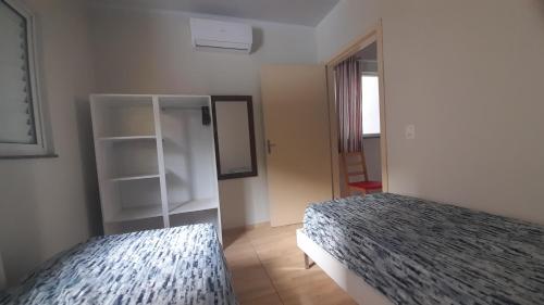 Ένα ή περισσότερα κρεβάτια σε δωμάτιο στο Casa Amarela
