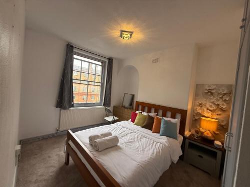 Ένα ή περισσότερα κρεβάτια σε δωμάτιο στο Tonbridge House