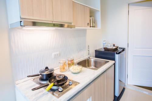 
A kitchen or kitchenette at Connext Residence
