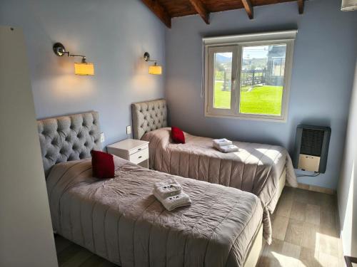 Una cama o camas en una habitación de Km cero