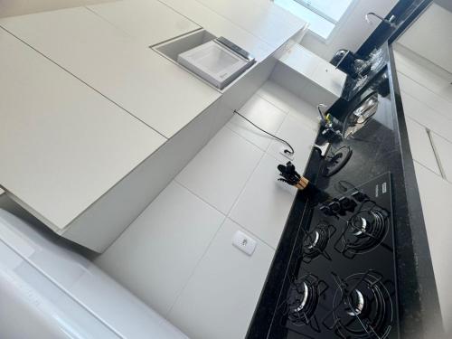 Kuchyň nebo kuchyňský kout v ubytování Reserva Almagre Apto 403