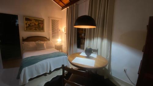 Cama o camas de una habitación en Cabana graciosa e aconchegante