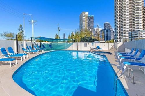 a swimming pool on the roof of a building at Sun-Kissed Escape - Broadbeach Gem - Hosted by Coastal Letting Co. in Gold Coast