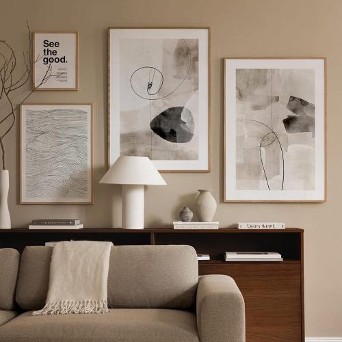 a living room with a couch and some pictures at Dreamy homestay Huế in Thôn Văn Dương