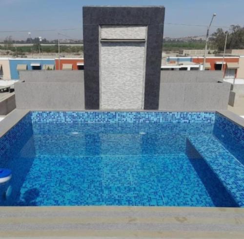 Bazén v ubytování Casa con piscina, terraza y parrilla en Ica nebo v jeho okolí