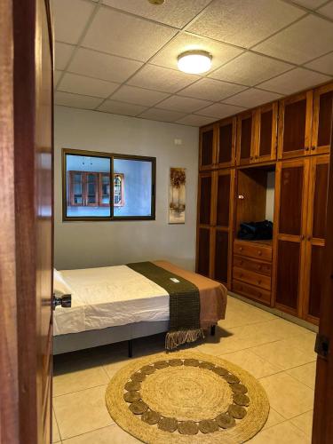 Un pat sau paturi într-o cameră la Altamar - Your family retreat in Chiriquí