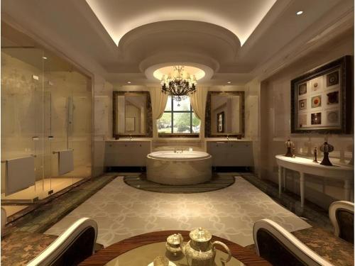 a large bathroom with a tub and a chandelier at Shenzhen Jin Mao Yuan Hotel in Shenzhen