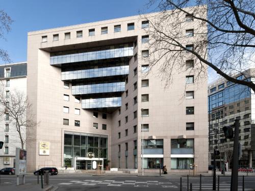 a large office building with a lot of windows at B&B HOTEL Lyon Centre Part-dieu Gambetta in Lyon