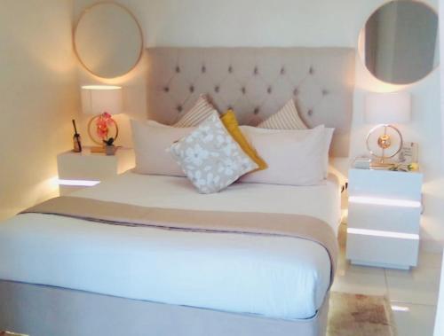 Ένα ή περισσότερα κρεβάτια σε δωμάτιο στο Silhouette 19 luxury
