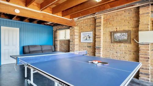 a ping pong table in a room at Aquavista Beach, Lake, Sun, and Sand in Budgewoi