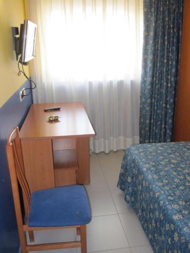 Ένα ή περισσότερα κρεβάτια σε δωμάτιο στο Hotel Blauet by Bossh! Hotels