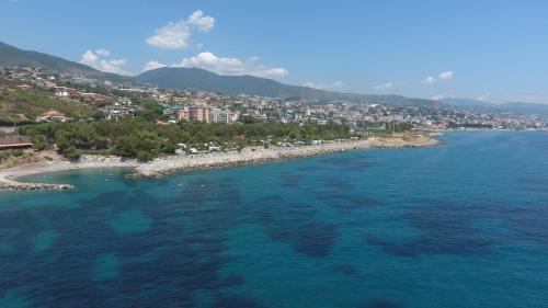 an aerial view of a city and the ocean at Villaggio Dei Fiori in Sanremo