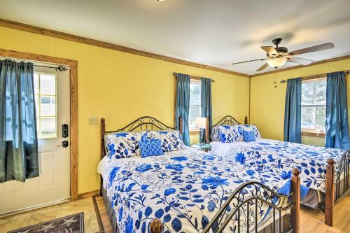 a bedroom with a bed and a ceiling fan at Family-Friendly Suite Autumn Midweek - 35 Off Promo! in Pleasant Mount