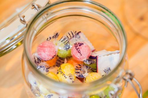 a glass jar filled with different types of food at Bij Jans in Hilvarenbeek