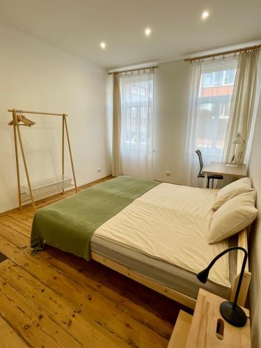Ένα ή περισσότερα κρεβάτια σε δωμάτιο στο Klints 9 Rent Apartments - Stay in Liepāja