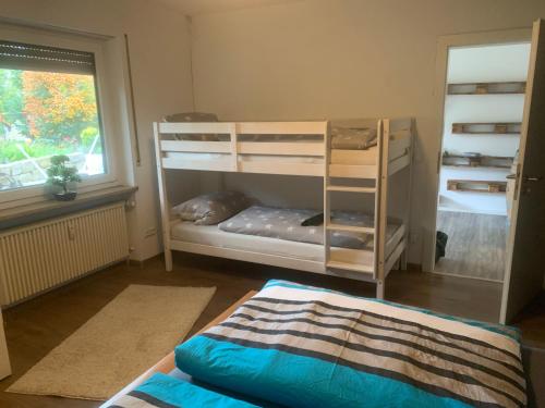 Postel nebo postele na pokoji v ubytování Ferienwohnung zum Kirschgarten