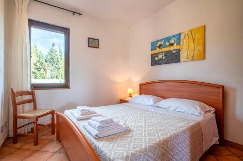 Postel nebo postele na pokoji v ubytování Villa Sorrentina - Suite Edera