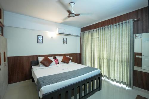 Giường trong phòng chung tại Sancta Maria Lounge -cochin Airport