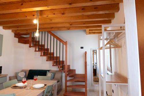 Khu vực ghế ngồi tại Cà Vecia - Apartments & Rooms