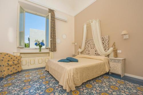Ліжко або ліжка в номері Villa Parisi Grand Hotel