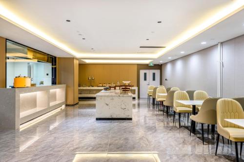 Ruang duduk di GreenTree Eastern Beijing Happy Valley Wangsiying Shuanghe Subway Station Hotel