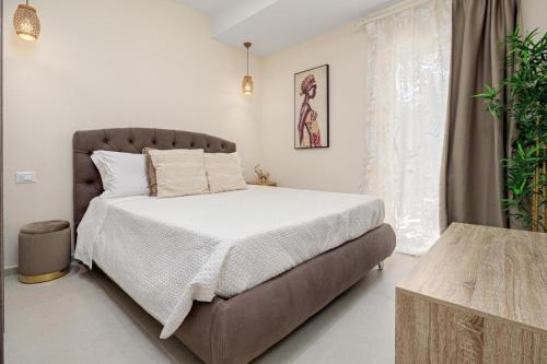 Katil atau katil-katil dalam bilik di Villa Leone con piscina privata