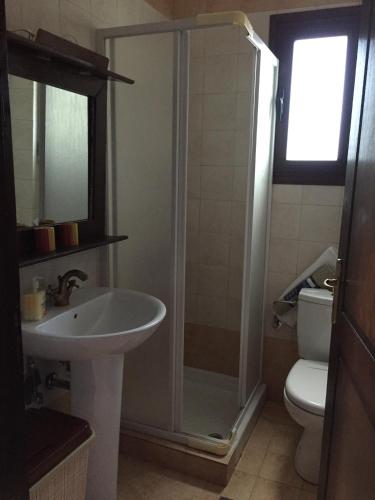 Ένα μπάνιο στο Vervekis Apartments