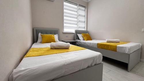 Ein Bett oder Betten in einem Zimmer der Unterkunft Comfort Point Hotel