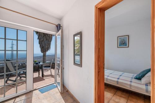Ένα ή περισσότερα κρεβάτια σε δωμάτιο στο Casa Eden
