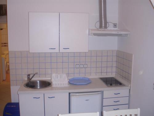Η κουζίνα ή μικρή κουζίνα στο Apartments Jeličić
