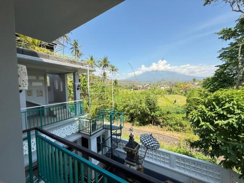a view from the balcony of a house at AMED LILI Private Room in Amed