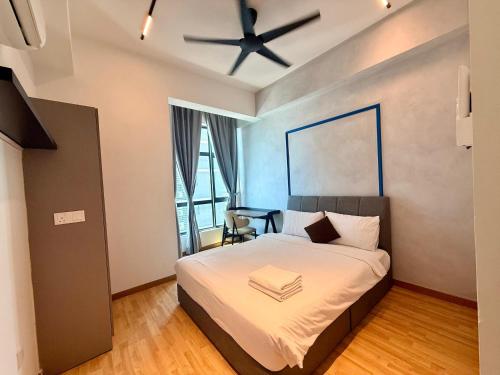 En eller flere senge i et værelse på Newston Family City View 2 Bedrooms