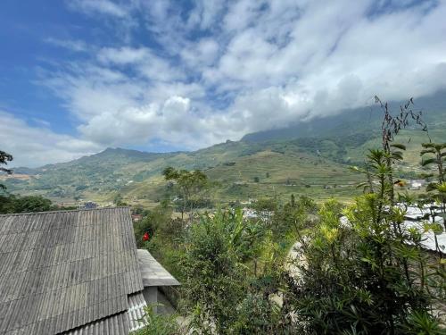 a view of a mountain from a house at Eco green Homestay in Sa Pa