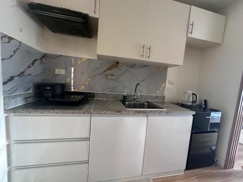 Fotografie z fotogalerie ubytování Holland Park v destinaci Biñan