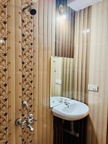 Koupelna v ubytování D Guest House